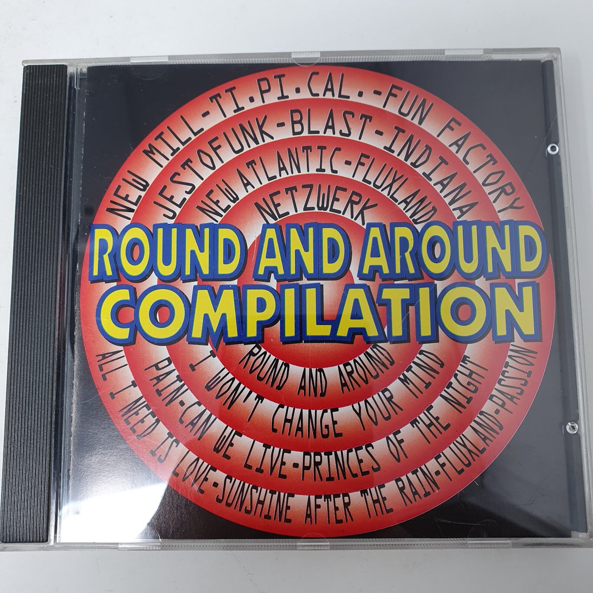 CD Various – Round And Around CompilationNew Music International