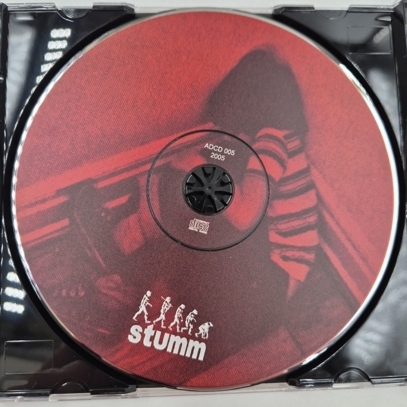 CD Stumm - I ADCD 005 CHOKEHOLD NARCOSIS Biting The Hand That Feeds