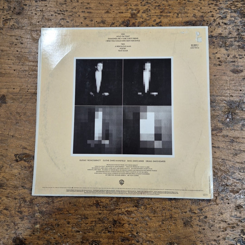 LP T-Bone Burnett - Trap Door 92 3691-1 Made In Germany Musica Rock Vinile