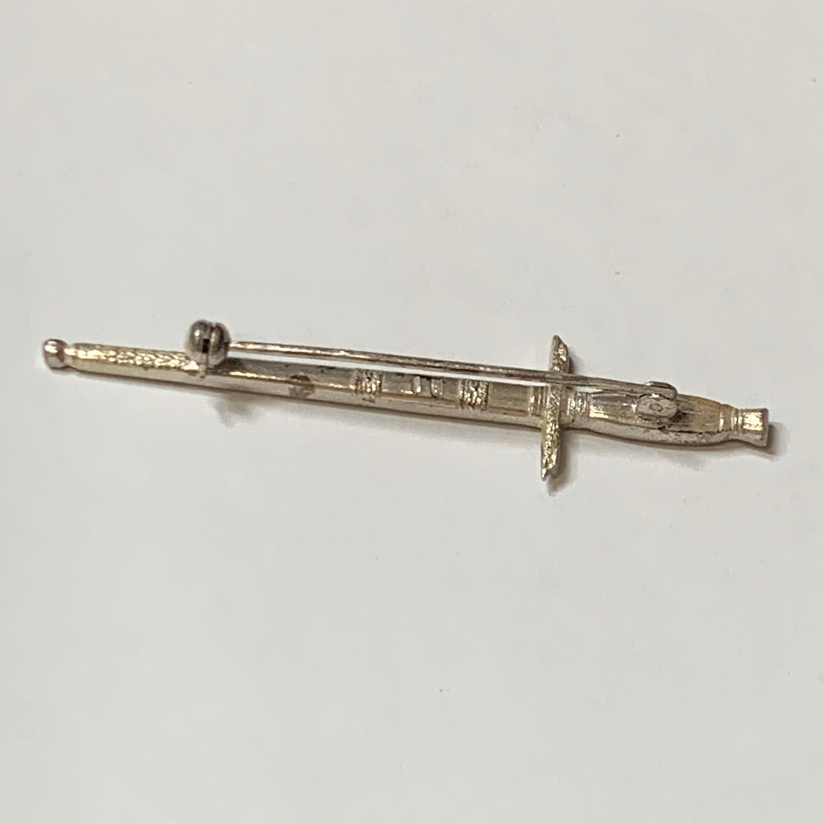 Spilla a forma di spada argento 800