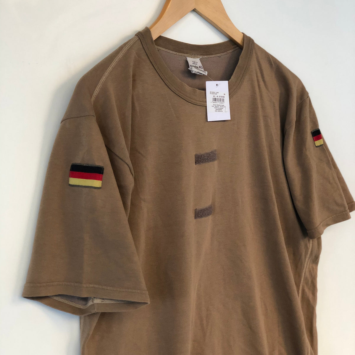 T shirt Kaki West.Germany 90’s All size