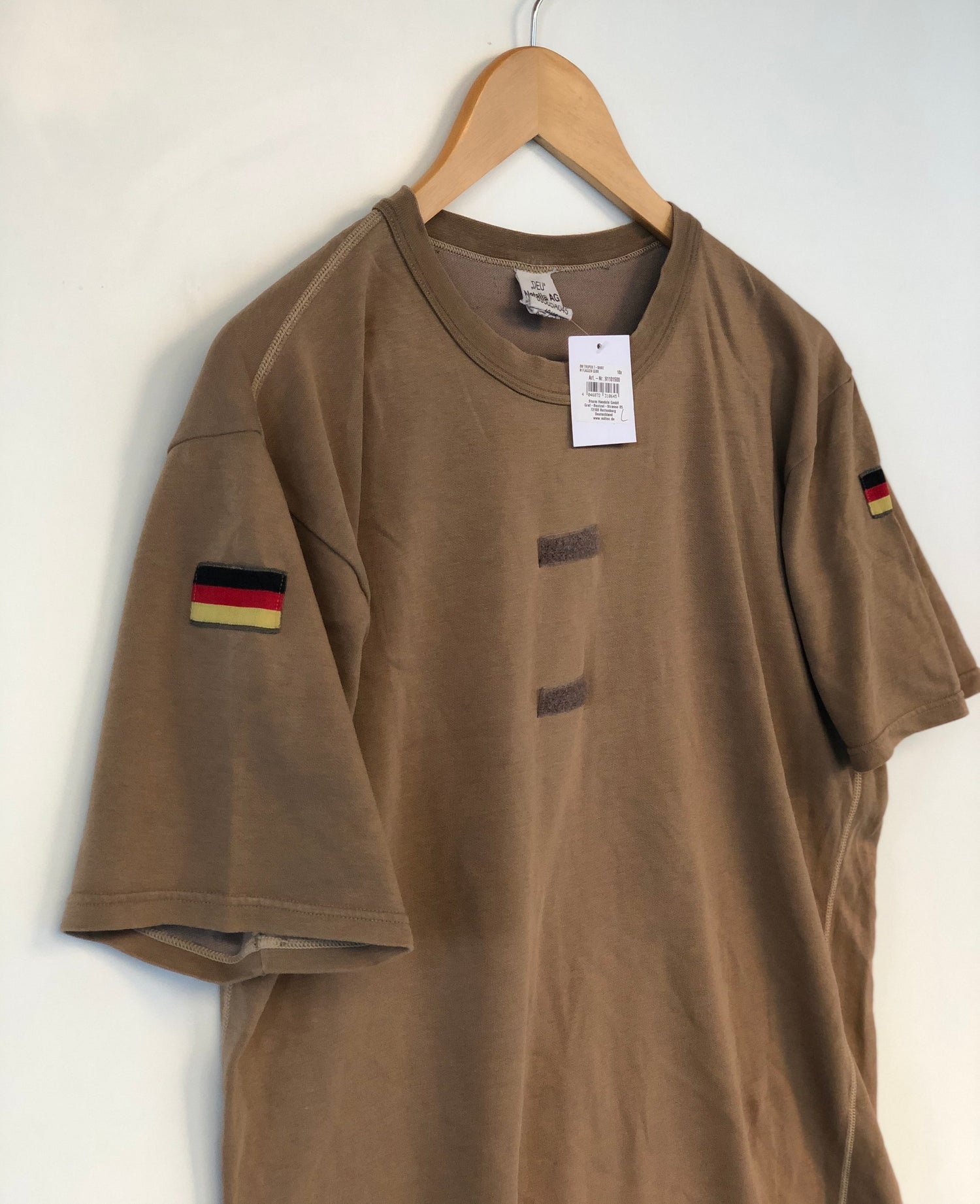 T shirt Kaki West.Germany 90’s All size