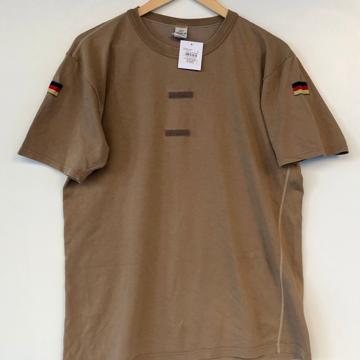 T shirt Kaki West.Germany 90’s All size