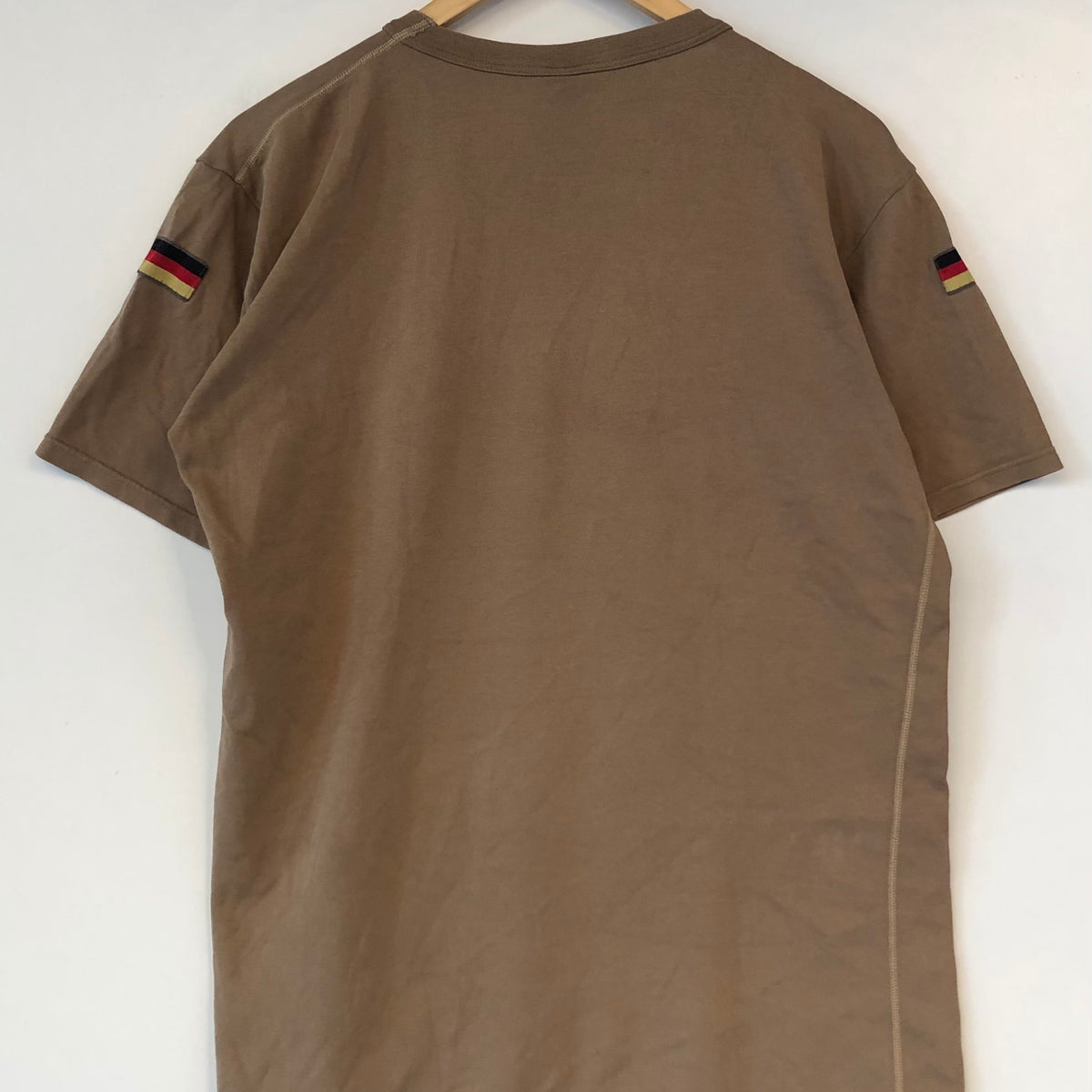 T shirt Kaki West.Germany 90’s All size
