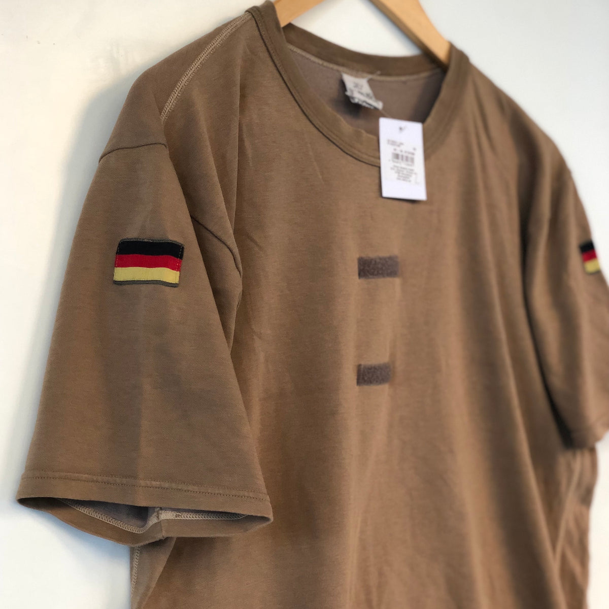 T shirt Kaki West.Germany 90’s All size